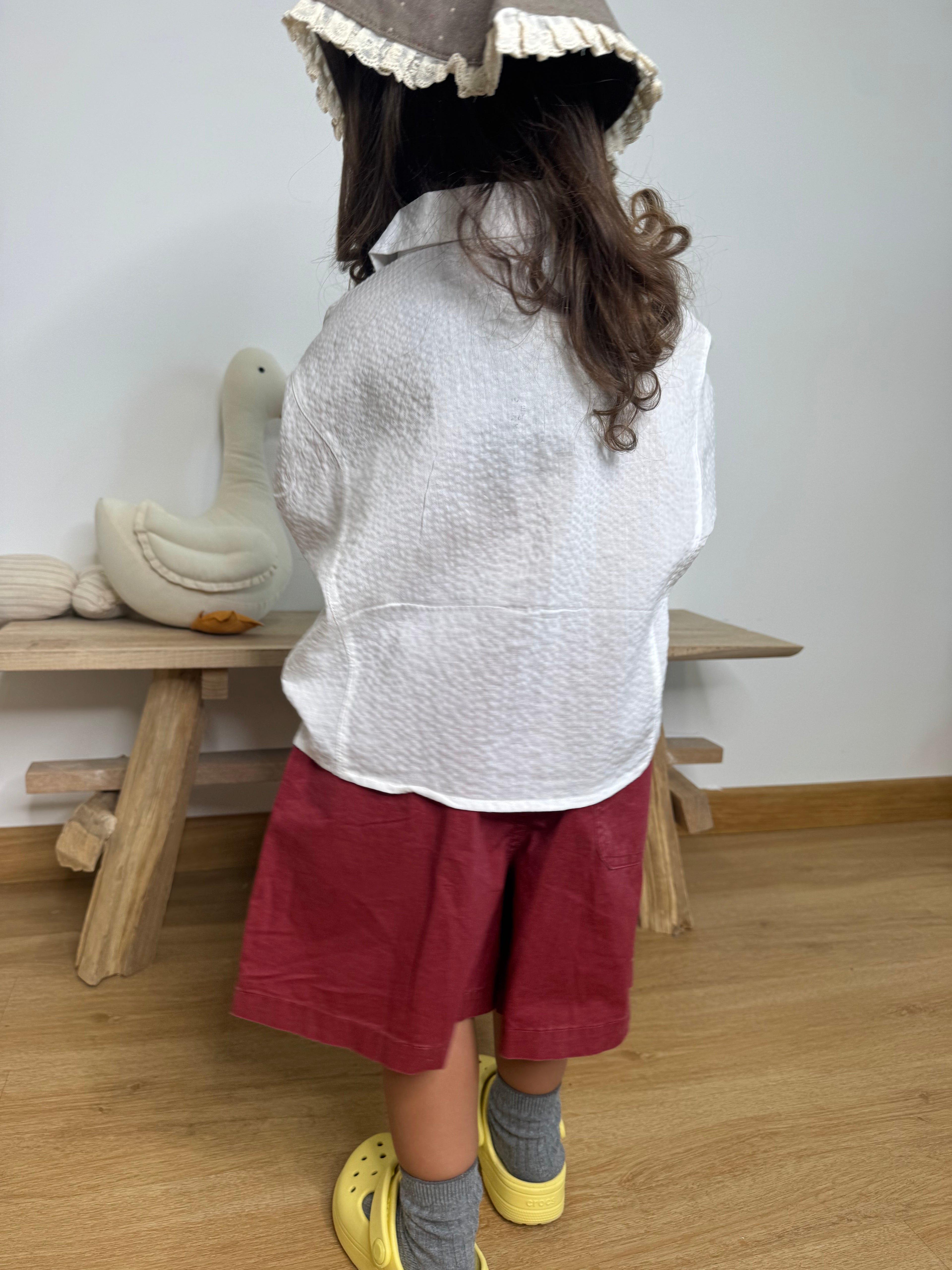 Shorts con tasca utility